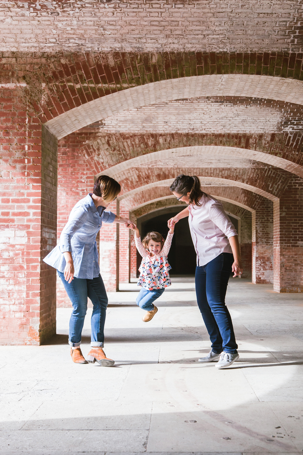 Swinging family portrait • Fort Point, San Francisco