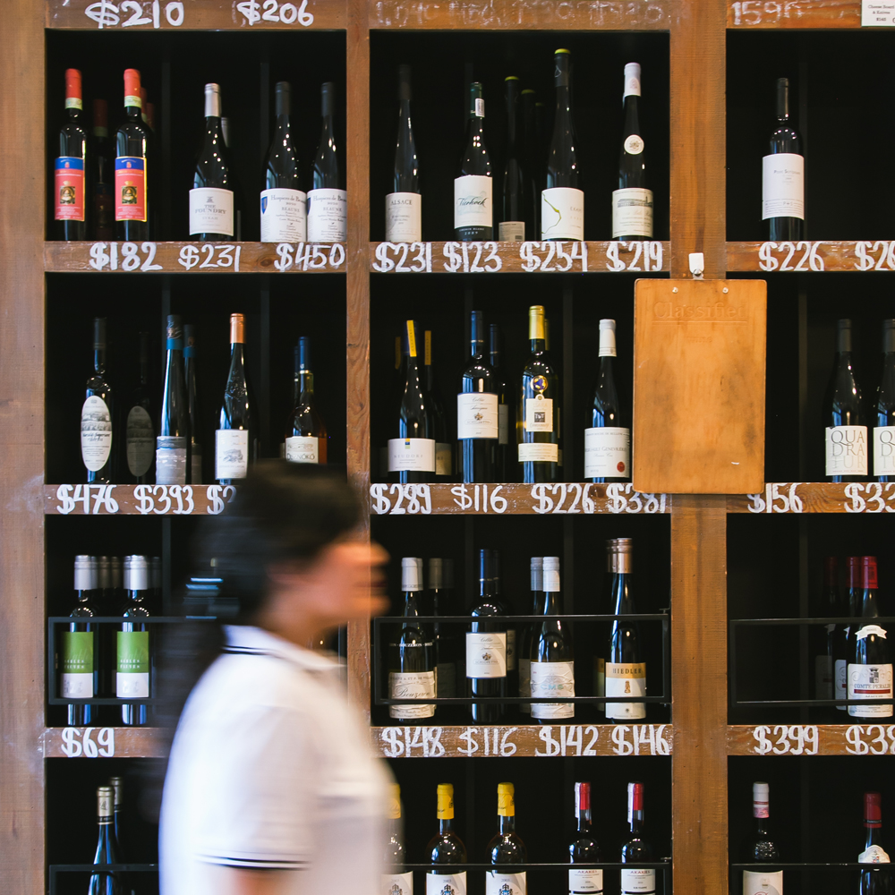 Movement at the wine shelves // Lifestyle Photographer in Hong Kong