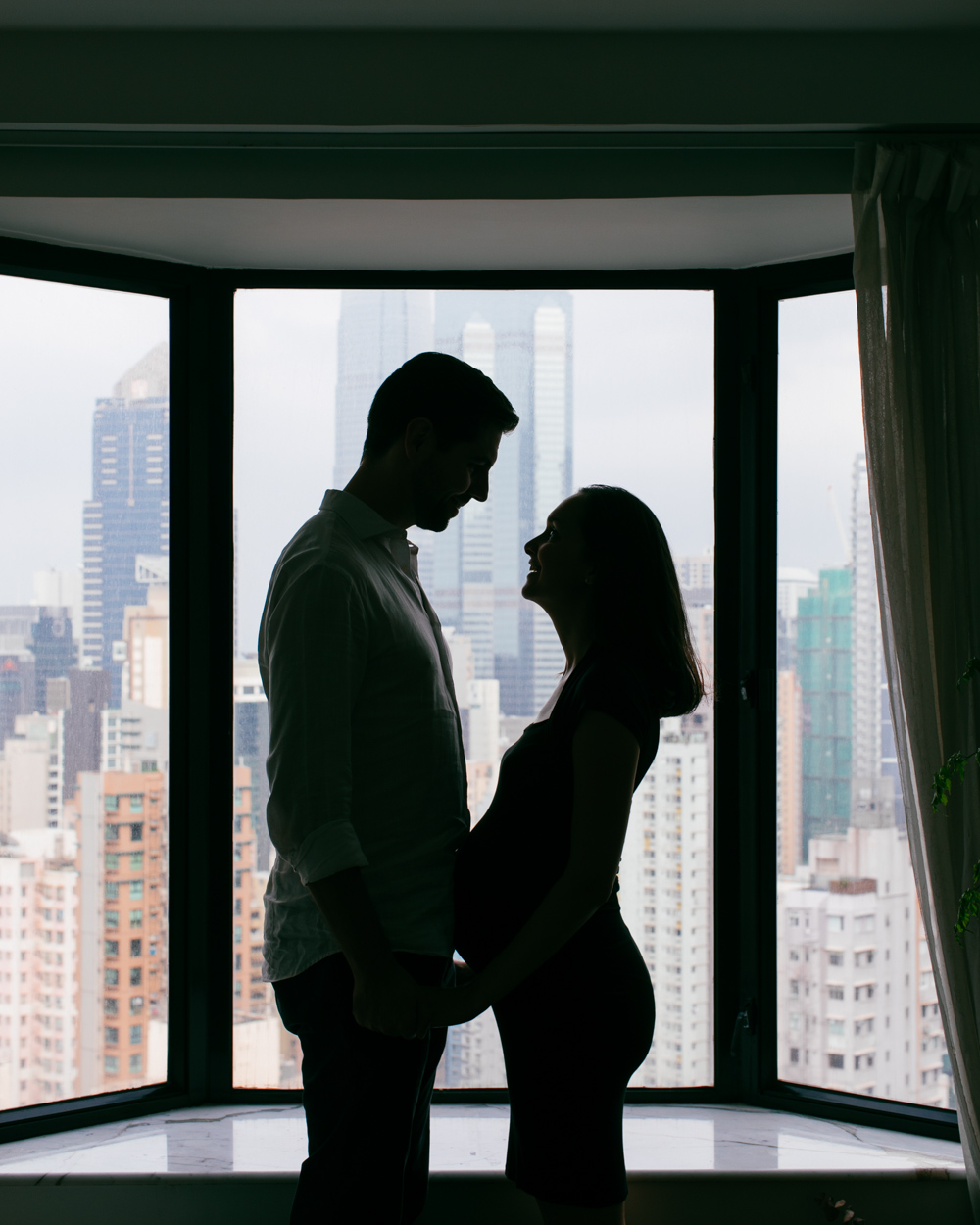 Beautiful Hong Kong skyline silhouette | Maternity & Family Portraits | by Tracy Wong