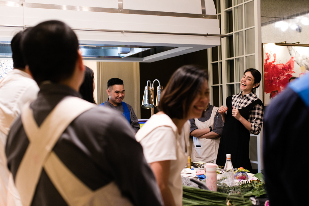 Mariana Velasquez, having a laugh with workshop students