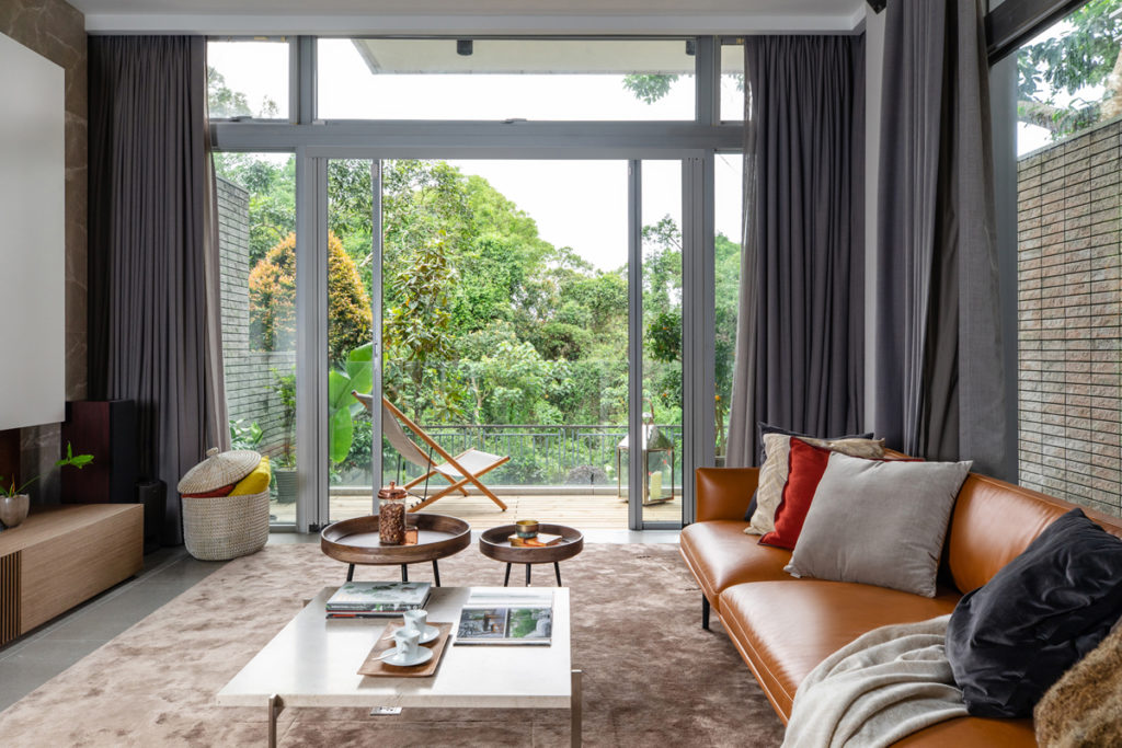 Green view out of Clearwater Bay home - Liquid Interiors